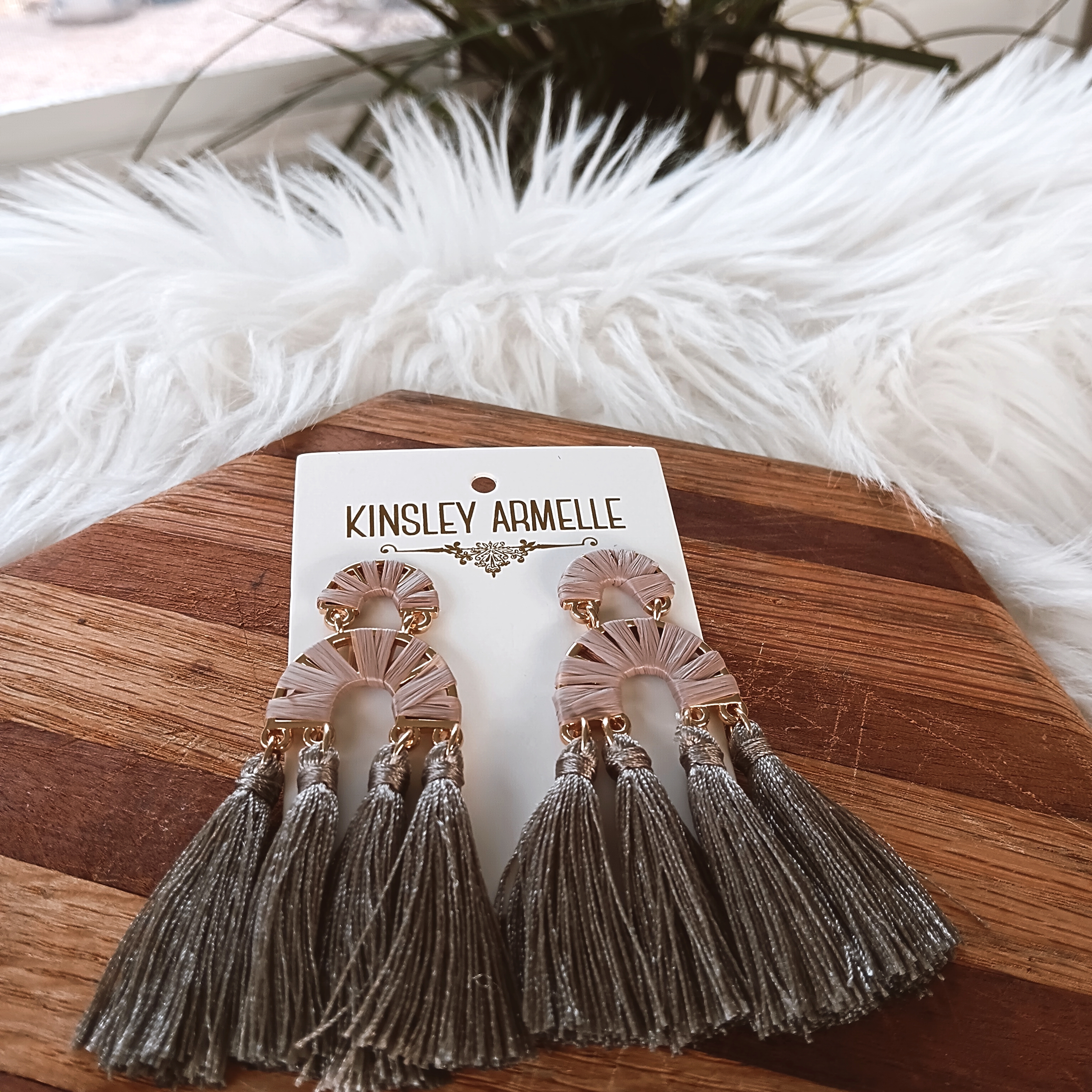 Kinsley Armelle Pavlova Misty Taupe Tassel Fringe Raffia Gold Arch Earrings
